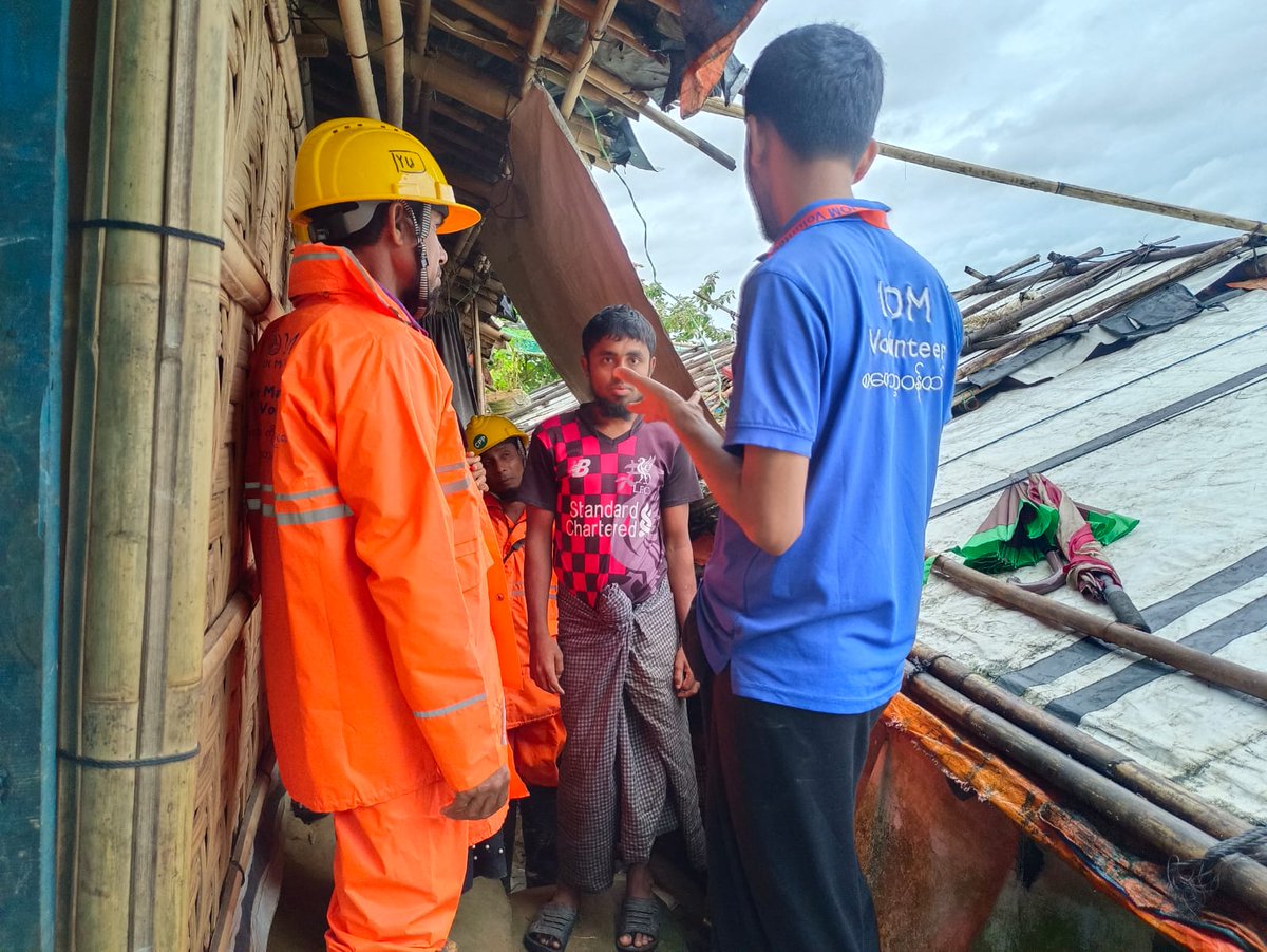 IOMBangladesh's tweet photo. 🌀 #HamoonCyclone strikes Cox's Bazar 🇧🇩, which endured #CycloneMocha just this May, resulting in damage to #Rohingya #refugees & host communities.
@UNmigration has been providing life-saving services 24/7 to the vulnerable #refugees throughout the cyclone.
#WithRefugees https://t.co/9nzSb4Bo21