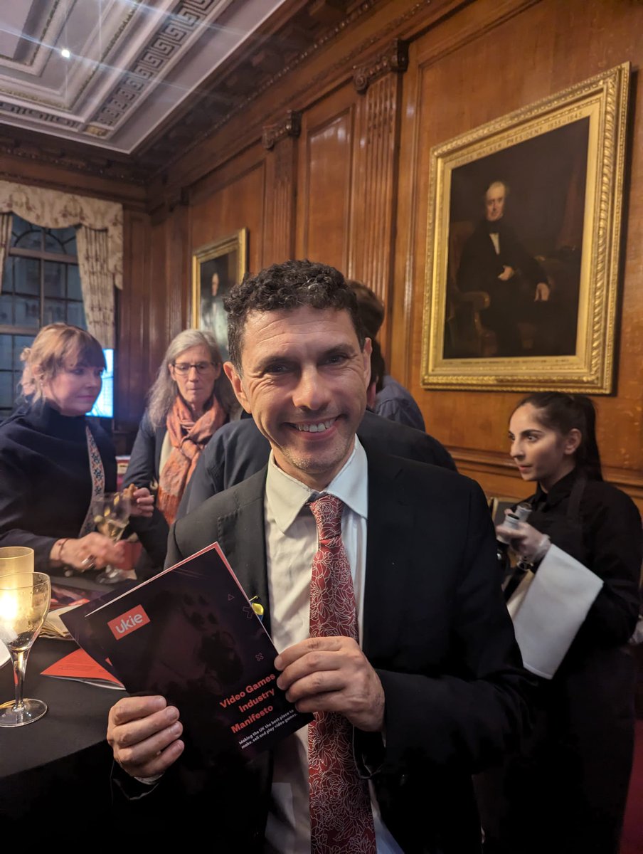 Last night - @RhonddaBryant checks out Assassin's Creed Mirage and @alexsobel picks up his copy of our Video Games Industry Manifesto at the launch event in Westminster 🎮