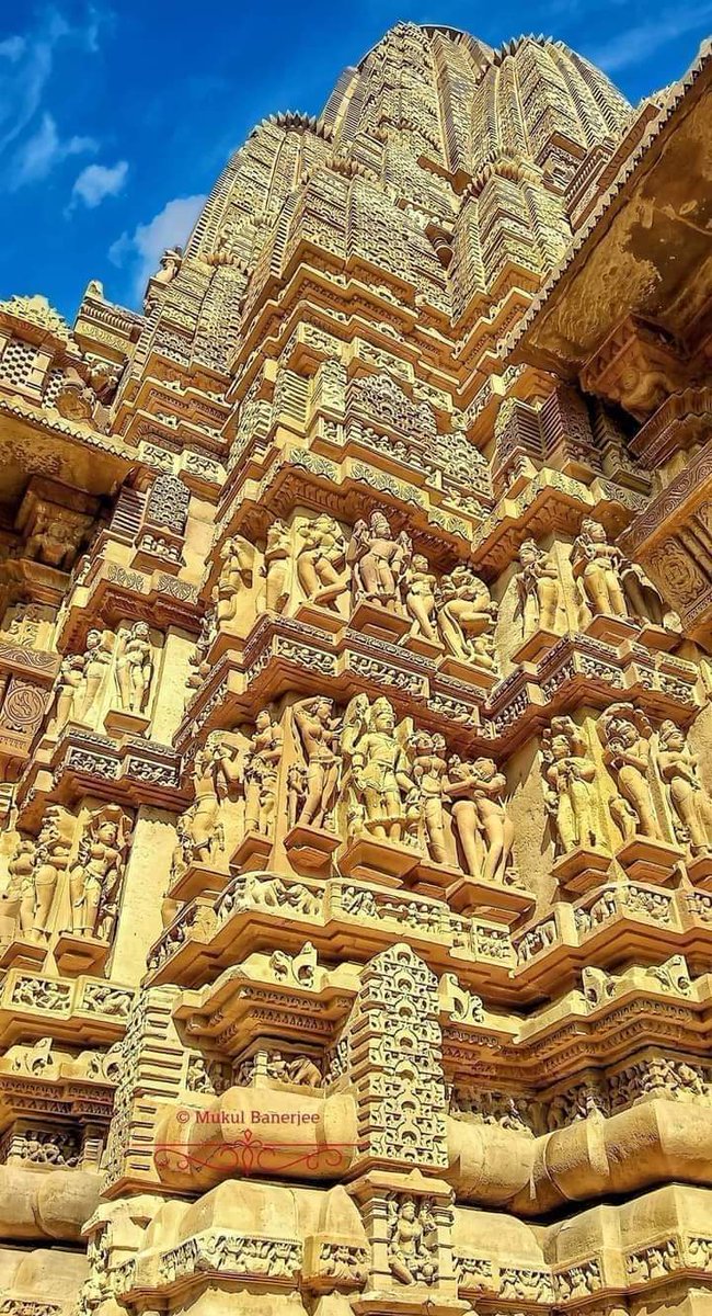 Beautifull stone curving of 940 CE Lakshmana temple, Khajuraho, Madhya Pradesh, India dedicated to Hindu God Vishnu. Built by Yashovarman.