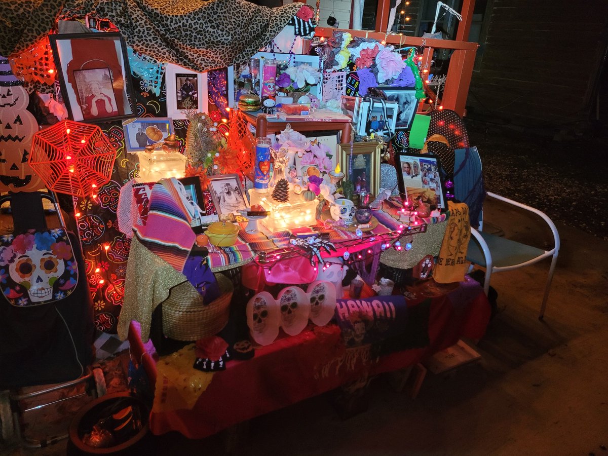 This is a beautiful ofrenda that a customer was so kind enough to uncover and let me take a picture of!! He told me a little bit about his family and how they've been celebrating for the past 2 years now!