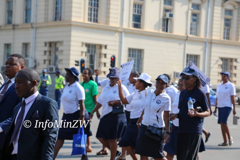 nickmangwana's tweet photo. Today, civil servants working at HQ in Harare marched in the CBD, demonstrating against the illegal sanctions imposed against Zimbabwe by the United States of America and other western nations. Today, 25 October, marks the SADC Anti-Sanctions Day as declared by regional leaders during a summit in August 2019. 
#ZimSanctionsMustGo