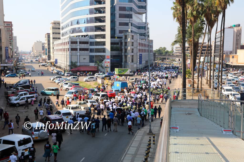 nickmangwana's tweet photo. Today, civil servants working at HQ in Harare marched in the CBD, demonstrating against the illegal sanctions imposed against Zimbabwe by the United States of America and other western nations. Today, 25 October, marks the SADC Anti-Sanctions Day as declared by regional leaders during a summit in August 2019. 
#ZimSanctionsMustGo