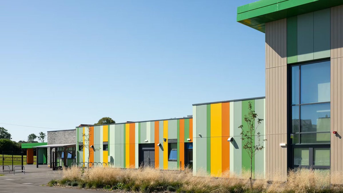 Wynne Construction led Ysgol Corn Hir School, North Wales' sustainable learning haven. <a href="/Rockpanel/">Rockpanel</a> 's colourful, durable facades embody the school's ethos. 
buff.ly/3QtsZf5