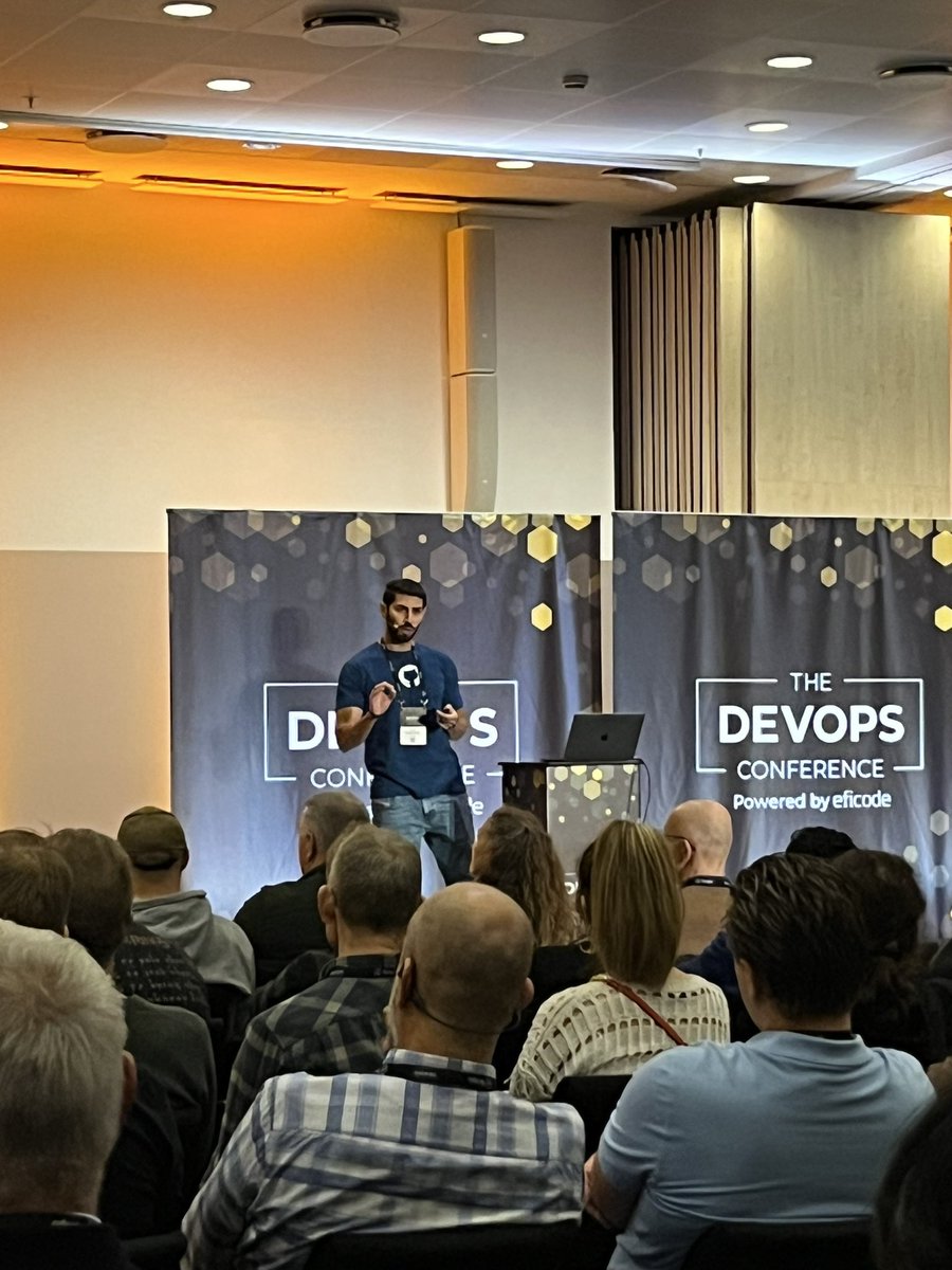 Eficode's tweet photo. “AI is already transforming how developers approach their day-to-day work.”, @jkcso from @github on his keynote on “Human vs #AI: how to ship secure code”
#TheDEVOPSConference https://t.co/BW8qT3drKc