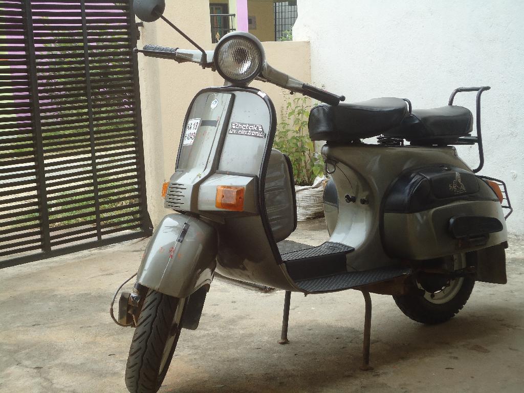 finshots's tweet photo. Bajaj Auto says that the Chetak now holds an 11% share in the e2W (electric two-wheeler) market. 

It’s a big jump from the 4% share they had at the end of FY23.

So, is Bajaj Chetak making a comeback? 👀👇🏽

You see, the Chetak changed how Indians commuted. It was what the Indian middle class needed at the time― a vehicle that was practical, not too expensive and helped everyone in the family move together.

So how did the Chetak fit into that mould?

During the 1940s, Piaggio created the Vespa. A couple of decades later Bajaj obtained a licence from Piaggio to sell Vespas in India. But when the licence expired in 1972,  Bajaj didn’t renew it.

Instead, it built a replica of the Vespa Sprint and called it ‘Chetak’― inspired by Maharana Pratap’s horse. And the Chetak lived up to its name.

It could withstand all kinds of terrains and required minimal maintenance. Even if it broke down, you’d see riders tilt their Chetaks to the right to reinstate fuel supply back to the engine. Or tilt to the left to shake up the fuel-air mixture to spark ignition. Yup!

Soon, Bajaj started selling 1 lakh scooters per month. The demand was so high that it was in short supply. And under the License Raj, automakers were only allowed to produce 25% more than their licensed capacity. So, the waiting period to own a Chetak even went up to 10 years!

CEO Rahul Bajaj fought to get a license to expand capacity. And the Chetak enjoyed decades of success in India.

But enter two-wheelers sans the gears and clutch with the added advantage of push-start functions, and the magic of the Chetak began to fade away.

Cut to today, technology is evolving quickly. EVs are becoming a rage.

And people want more mileage & reduced charging times. So, the Chetak EV is trying to ride that wave. It also has the added advantage of the nostalgic factor and is a pop culture icon too.

Could that push its market share up a notch again? You tell us.

Follow @finshots for more insightful content. 

And don’t forget to subscribe to our 3-min, jargon-free daily newsletter to stay up to date on everything business and finance.