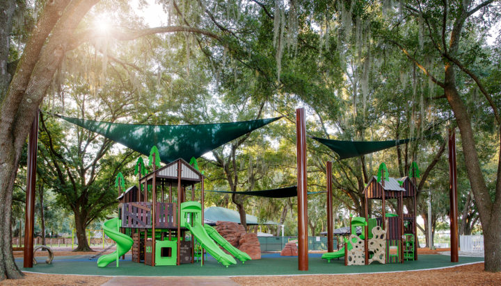 ProPlaygrounds's tweet image. This adorable wilderness themed playground located in Wintersprings, FL features our nature theme play system, boulder climbers, and shade structures that creates an elevated and cohesive look to this park.