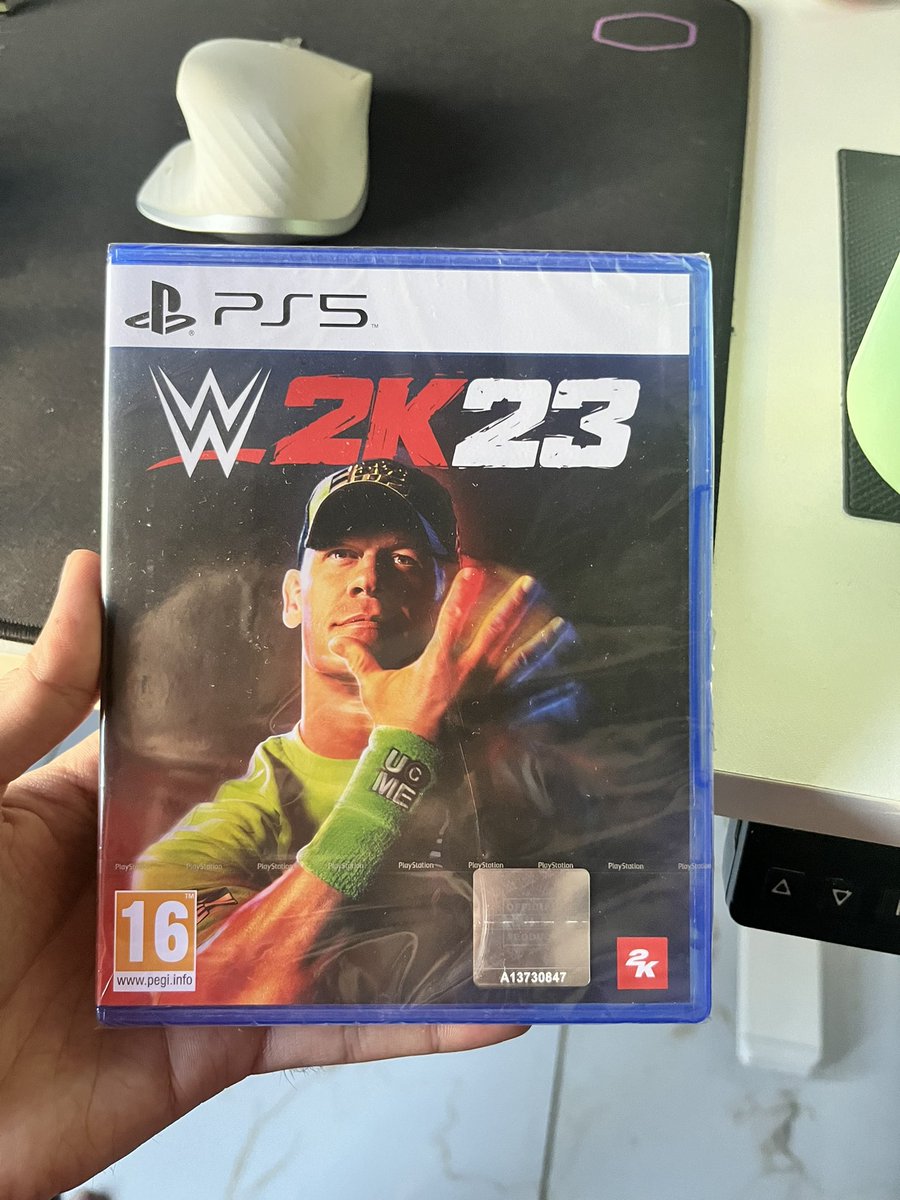 MustafaHKhan's tweet photo. I preordered #Spiderman2 but got WWE 2K23 delivered instead 🫠. This cover featuring John Cena with his ‘You can’t see me’ pose is ironic, because now I can’t see Peter, Miles, or Venom either!” https://t.co/2DU9jqvyIN