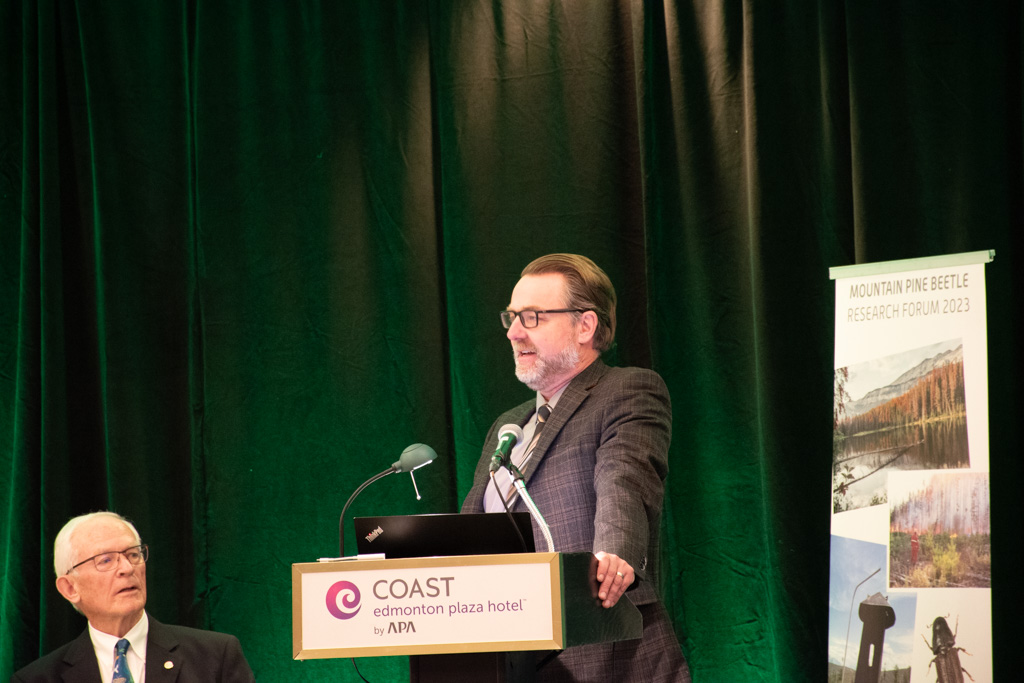 fRIresearch's tweet photo. The Federal-Provincial #MPBForum is underway! Setting the stage for the next 2-days of science are Caroline Whitehouse and Daniel Lux (@ABForestryParks), and Keith McClain and Barry White (@fRIresearch). https://t.co/6TvRuHo1do