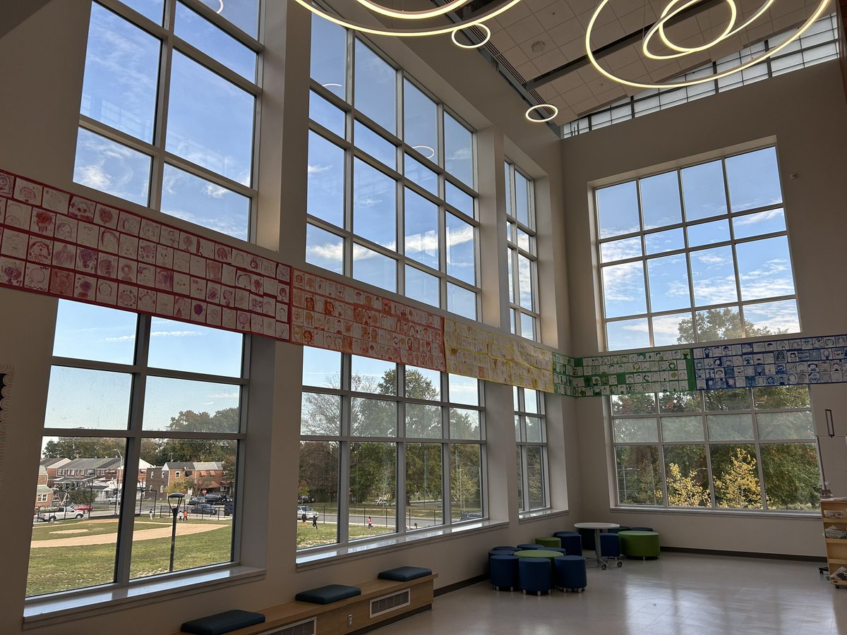 A wonderful way to represent every student at school. A rainbow of self portraits using colors by grade. Brings me joy to look at! <a href="/ColgateES/">Colgate Elementary</a> has a great art teacher 🎨 🌈