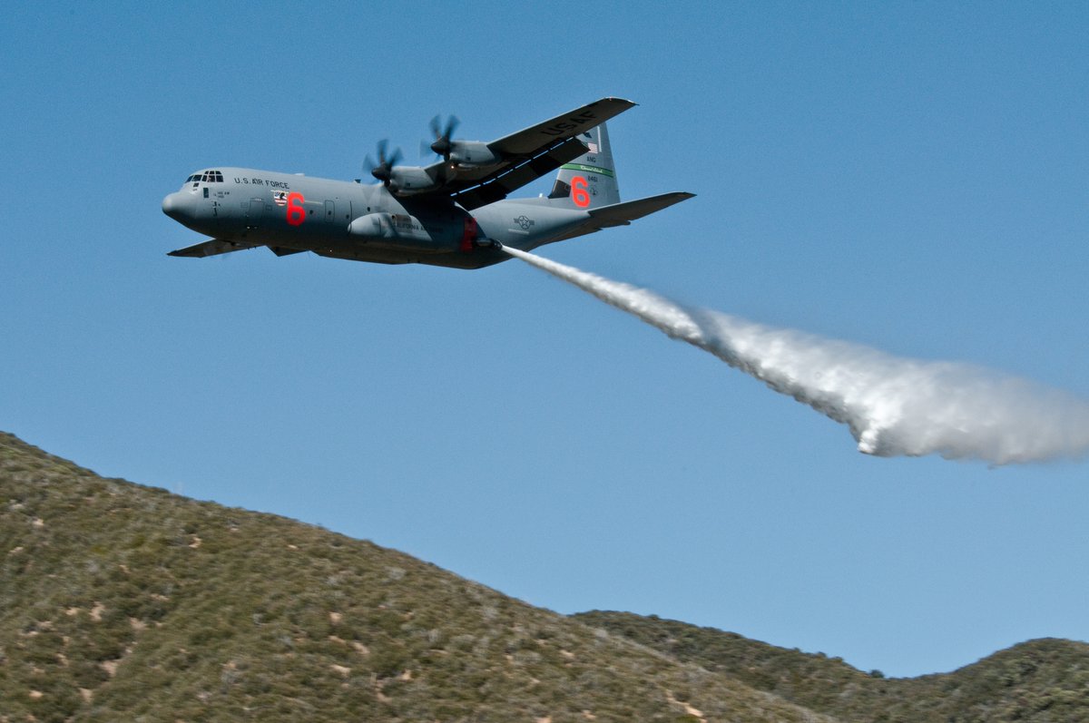A C-130J Hercules aircraft equipped with Modular Airborne Firefighting System performs a water drop in the Angeles National Forest near Los Angeles.  #MAFFS #C130 #C-130 #C130Hercules #Wildfires #USFS #AirNationalGuard #HollywoodGuard #AerialFirefighting #DVIDSHub #Wildfire