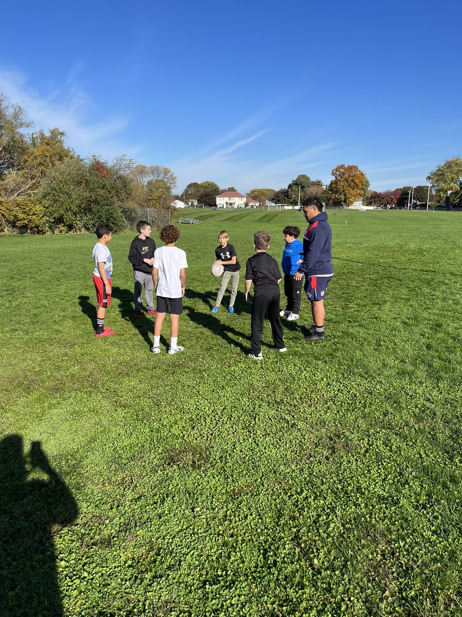 5th graders had an awesome time this morning spending some time with the @NEFreeJacks rugby team! We learned how to toss the rugby ball, kick it three ways, and even had a relay race. Thank you to the Freejacks for helping make this happen!