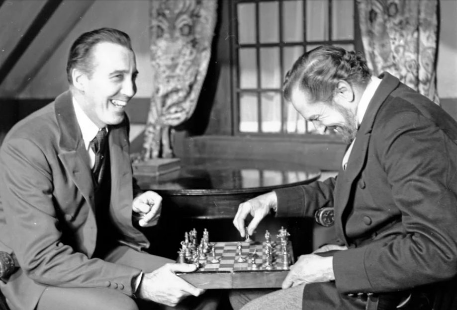 Christopher Lee playing chess with Vincent Price in 1968 at Shepperton Studios (just down the road from J G Ballard's house) while working on 'The Oblong Box.'
