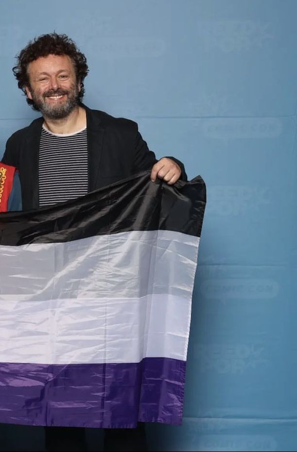 AziraFirefly's tweet photo. HELLO??? I DIDNT KNOW THIS PIC OF MICHAEL CARRYING THE ACE FLAG EXISTS OMFG????

HAPPY ACE AWARENESS WEEK BITCHES!!! AAAAAAAAAAAAAAAAAA https://t.co/6DAYYIePz6