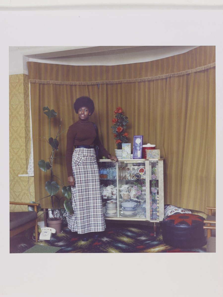 rootsdeh's tweet photo. British-Jamaican photographer Neil Kenlock photographed a number of subjects across London in their homes. Images like this were taken to send back to relatives in the Caribbean to show settlement in Britain. https://t.co/wFKJFZyYKc