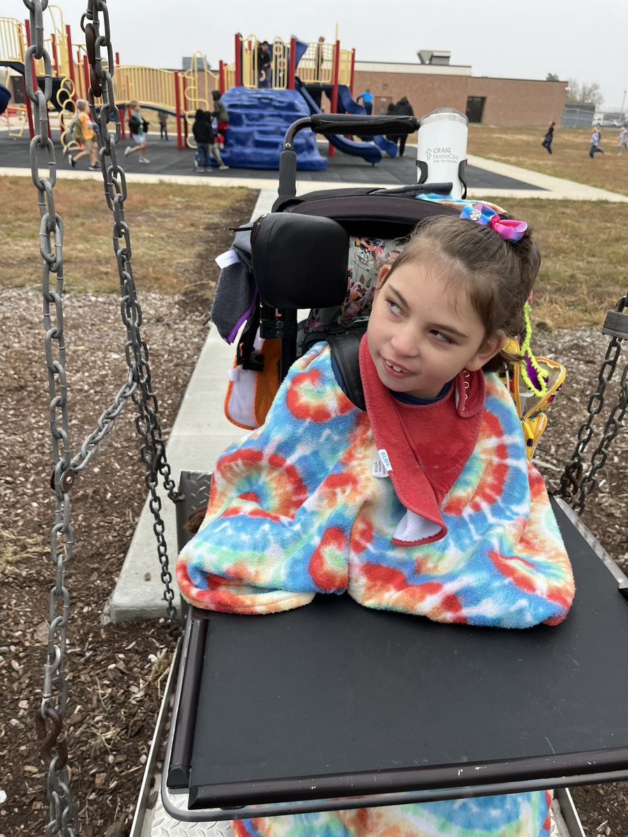 Grateful for @AuroraHuskies dedication to inclusion. They built a sidewalk to make sure Karsyn can reach her swing! Thank you! #InclusiveEducation #Gratitude