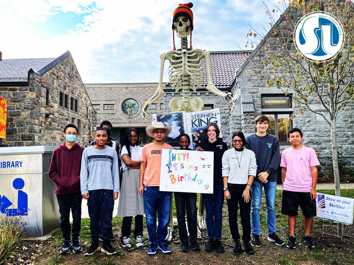StratfordLib's tweet photo. If you don’t take a #skelfie w/ #BillyBones on your birthday, is it even your birthday? Happy Birthday to teen volunteer Amari, who celebrated w/ his fellow volunteers @ the Library today! If you take a skelfie w/ Billy, @ us so we can feature you! *Custom bday sign not required. https://t.co/OFtPpxxB79