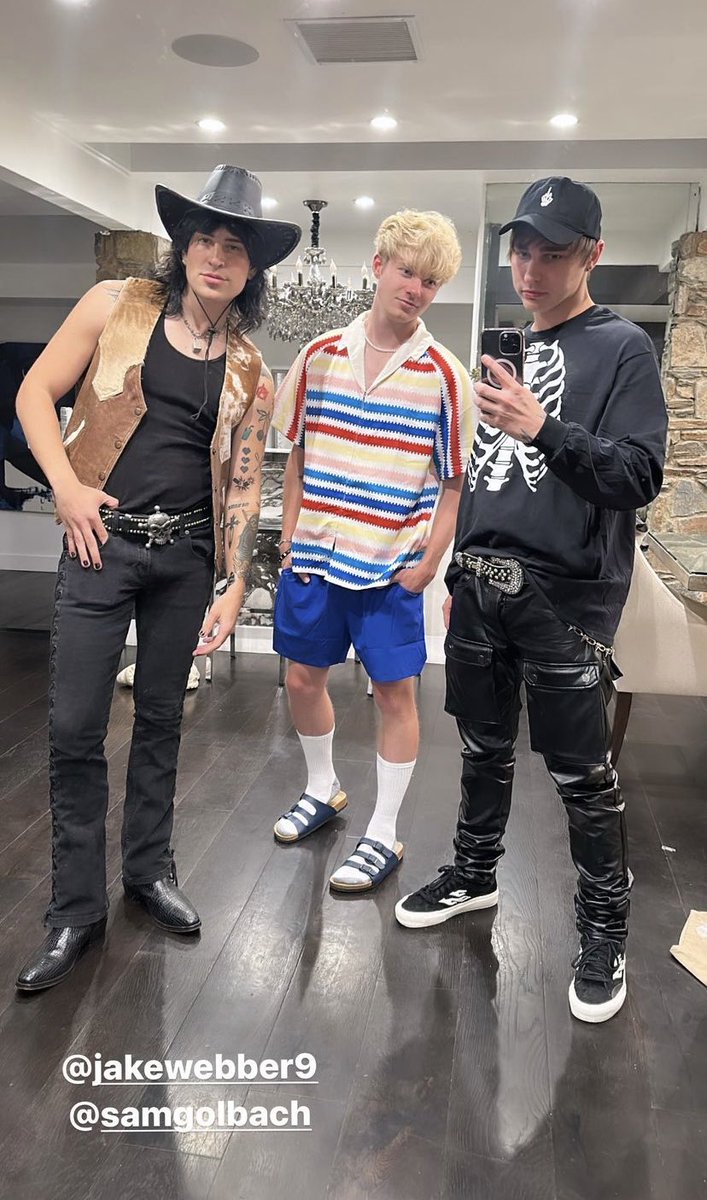 so sam is dressed as the average beach party dad and colby's dressed as... himself?