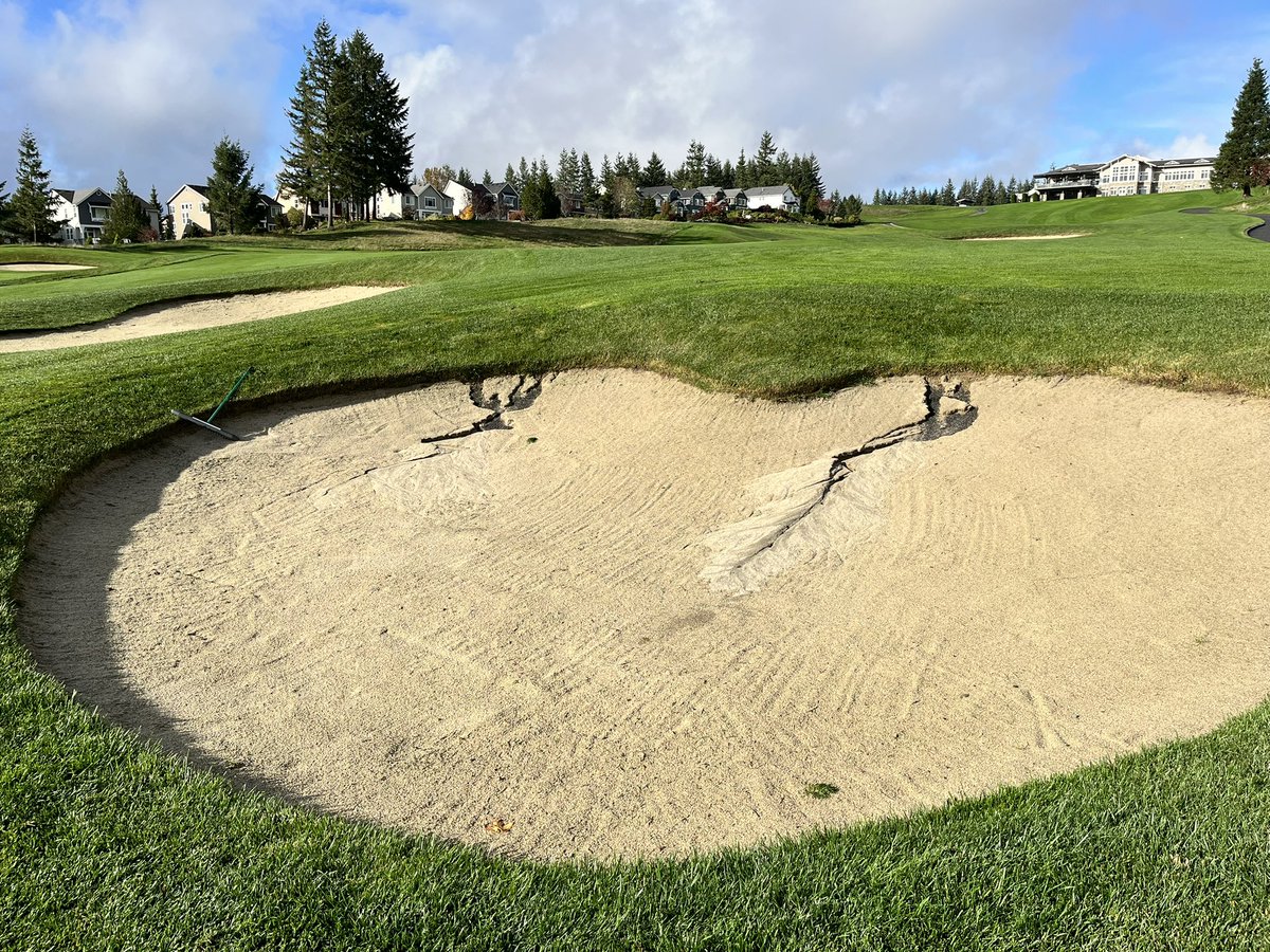 RyanWGor's tweet photo. Almost 1” of rain last night.  Out of 110 bunkers on course, this was the ONLY wash out.  Two years ago, we would be looking at 2 days of repairs and silt/rock contamination of the sand.  Not anymore!  @PorousPave @CapillaryFlow   Brings a smile to my face. https://t.co/H73j6AG4Hj