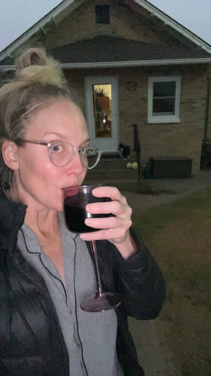 jrmessinger77's tweet photo. You know it’s been a week when you’re out walking your indoor/outdoor cat with a glass of wine in your pjs on the farm. #sorrynotsorry #thisismiddleage https://t.co/effgCOSYCI