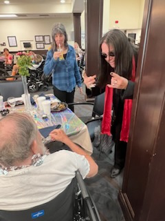 VioletSpringsHC's tweet photo. Well holy......it's OZZY 🦇 An icon from the 80s came and reeked havoc with our residents! 🎸 🎵 #TrilogyLiving #GroovinWithTrilogy #TrilogyThemeWeek #DancingThroughTheDecades https://t.co/CEMIDvS0PL