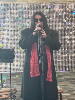 VioletSpringsHC's tweet photo. Well holy......it's OZZY 🦇 An icon from the 80s came and reeked havoc with our residents! 🎸 🎵 #TrilogyLiving #GroovinWithTrilogy #TrilogyThemeWeek #DancingThroughTheDecades https://t.co/CEMIDvS0PL