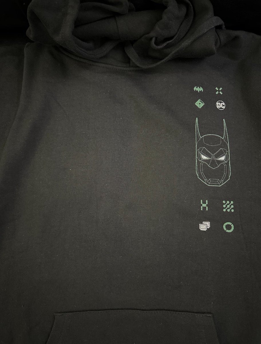 ✈️ Just landed after a long day of flying and the <a href="/DCNFTOfficial/">DCNFTOfficial</a> <a href="/batcowls/">DC Bat Cowls</a> merch saga continues! 🦇

📦 Got a delivery notification and the excitement was real. I was like, "Please, no misspelled words, and at least a cowl representation on the back of my hoodie." Simple wishes,