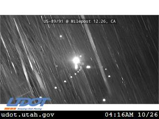 NWSSaltLakeCity's tweet photo. Good morning, Utah! We have rain coming down in the valleys of northern Utah/SW Wyoming, but we are seeing snow along mountain passes. Here is a udot camera in Sardine Canyon. Give yourself some extra time if driving through higher terrain this morning. #utwx #wywx https://t.co/oLvBf8Ecep