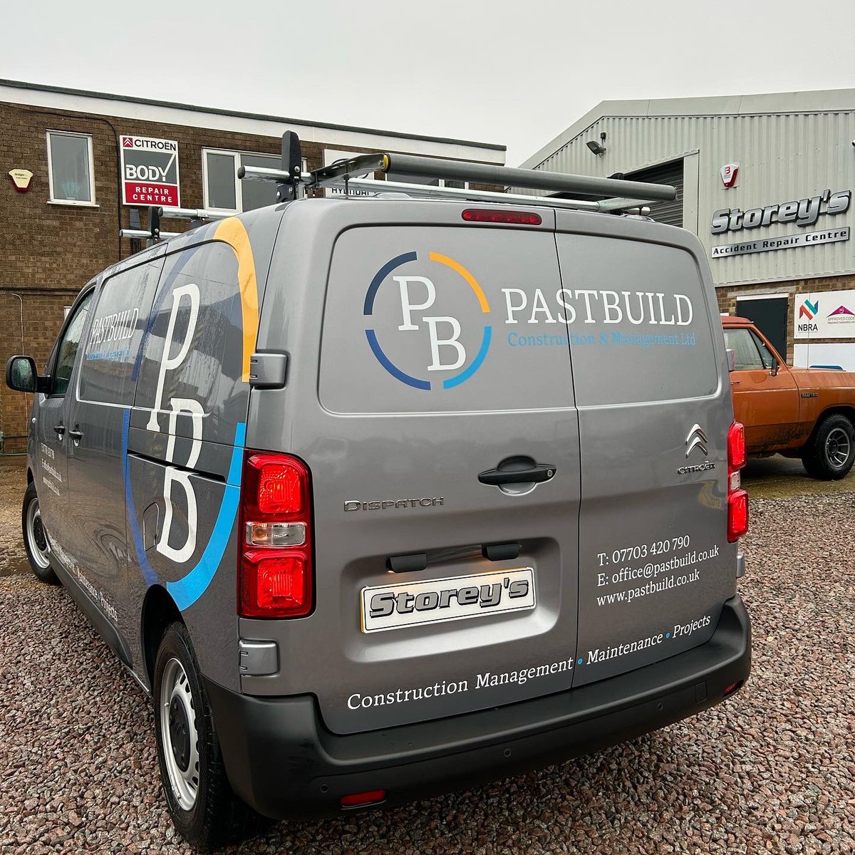 Rear end repairs completed on another van.