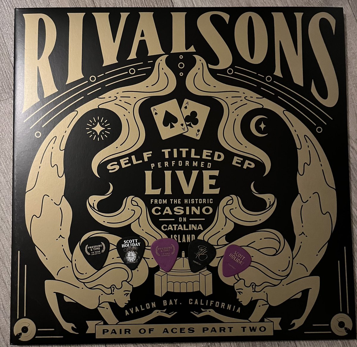 RivalSonsFansUK's tweet photo. Last day to win this Catalina vinyl and some guitar picks. To be in the draw get an extra copy of Lightbringer today and send us proof. It’s only £3.99 for a digital copy on Amazon or ITunes. We really want to help get our guys a great chart position tomorrow. Let’s do this 👌🏻❤️ https://t.co/JHInGDyaje