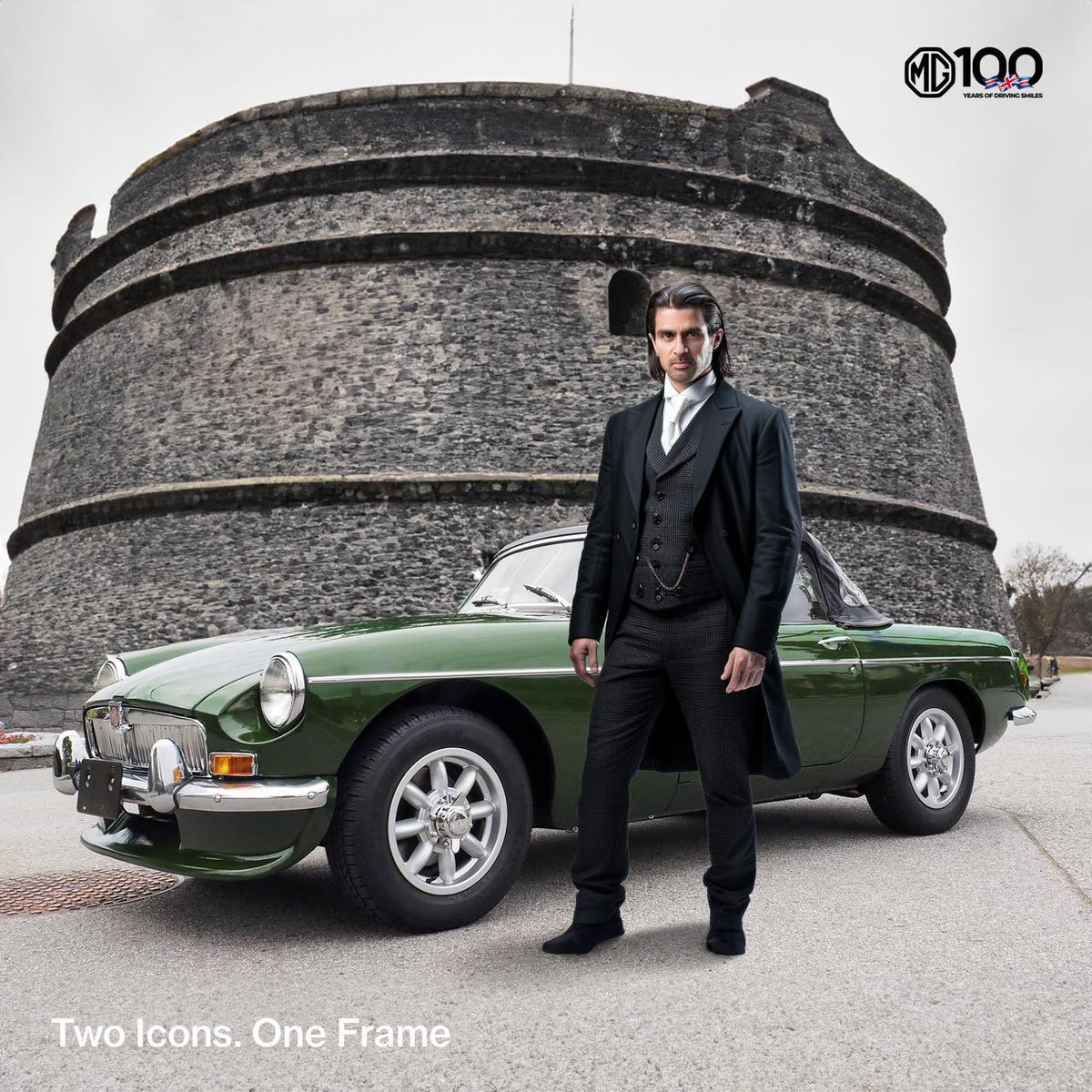 sidpatankar's tweet photo. MG’s having some #AI fun @ our expense 😝To mark 100 years of the brand. Tho the co is not quite the same one - still  gr8 heritage. I love the gorgeous MGB with me. Model from ‘60s that defined MG. &amp; I hope this pic tells ppl: think twice b4 crossing me:)
SVP 

#100YearsofMG https://t.co/owu4XaFOag