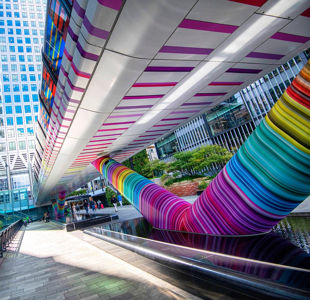 Adams Plaza Bridge I love photographing this bridge in Canary Wharf, even more so now they've added so much colour to the bottom of it....just gorgeous :) #London #CanaryWharf
