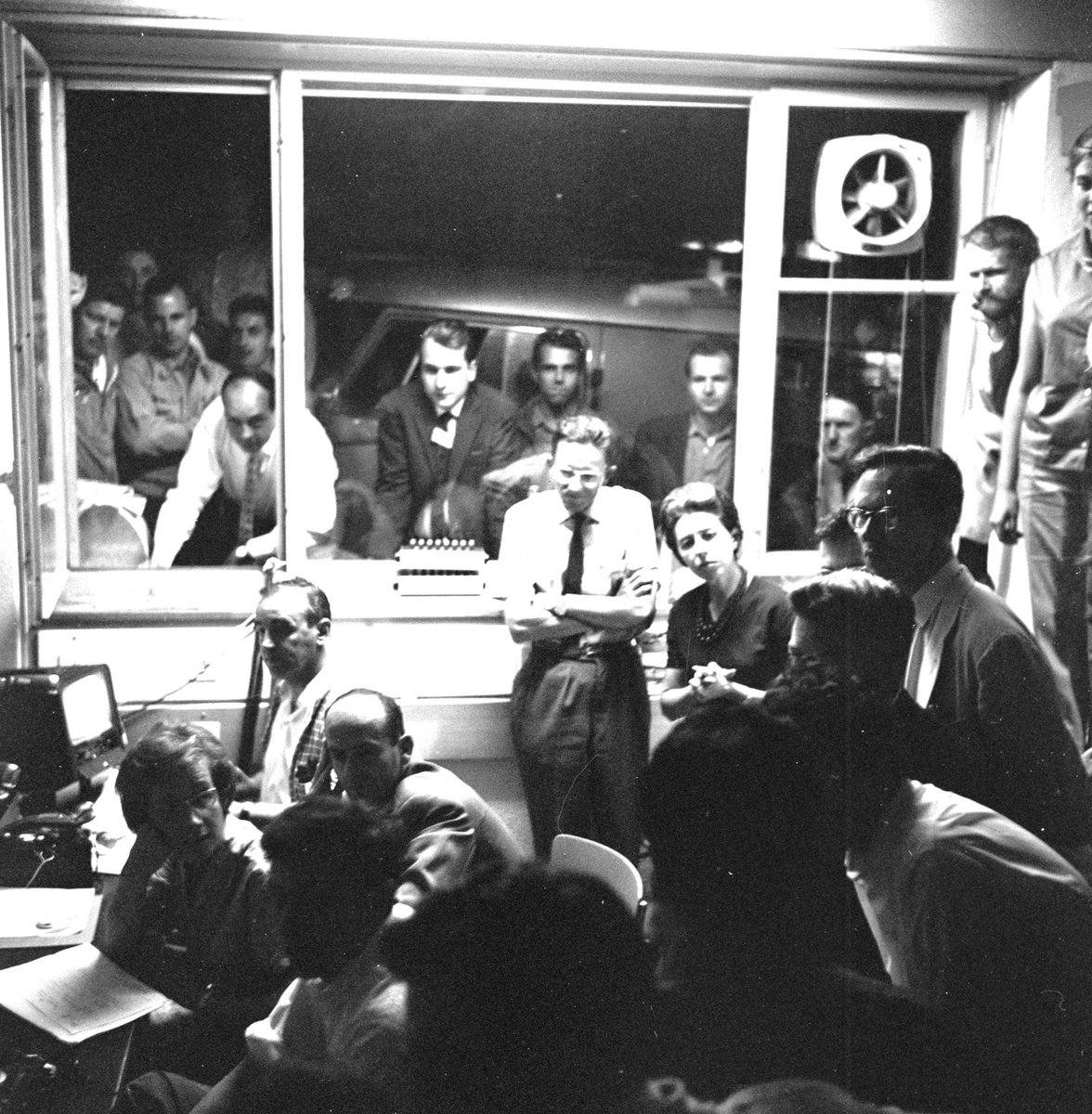 CERN's tweet photo. What show is on tonight? 📺

This #ThrowbackThursday, we go back to the summer of 1962. Here we see a group of scientists in the Proton Synchrotron (PS) Control room, taking a break from work to watch the very first TV transmission between Europe and the United States via the TELSTAR satellite.

The PS, CERN’s first synchrotron, is a key component in the Laboratory’s accelerator complex, where it usually accelerates either protons delivered by the Proton Synchrotron Booster or heavy ions from the Low Energy Ion Ring (LEIR).

Find out more: https://t.co/Ea6ODNi537