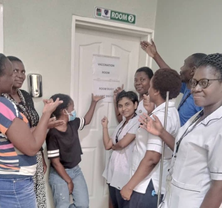 MelitaGordon5's tweet image. On this day, 2023, this crack team waiting outside on tenterhooks while the first person in Africa to receive an #iNTS GMMA #vaccine is randomised and vaccinated, behind this very door. Vaccine history-makers look like this. So, so proud of them all. @MLW_Programme @LivUni_IVES