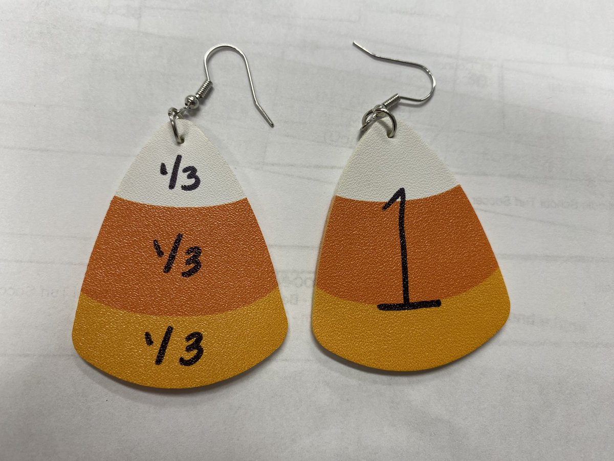 DanielleLegnard's tweet photo. You know you have the Math Curse when you take a sharpie marker and turn your candy corn earrings into fraction earrings!! #mathtastic #themathcurse @BethelCTSuper @brookskristen1 https://t.co/3GgaFBVjwm