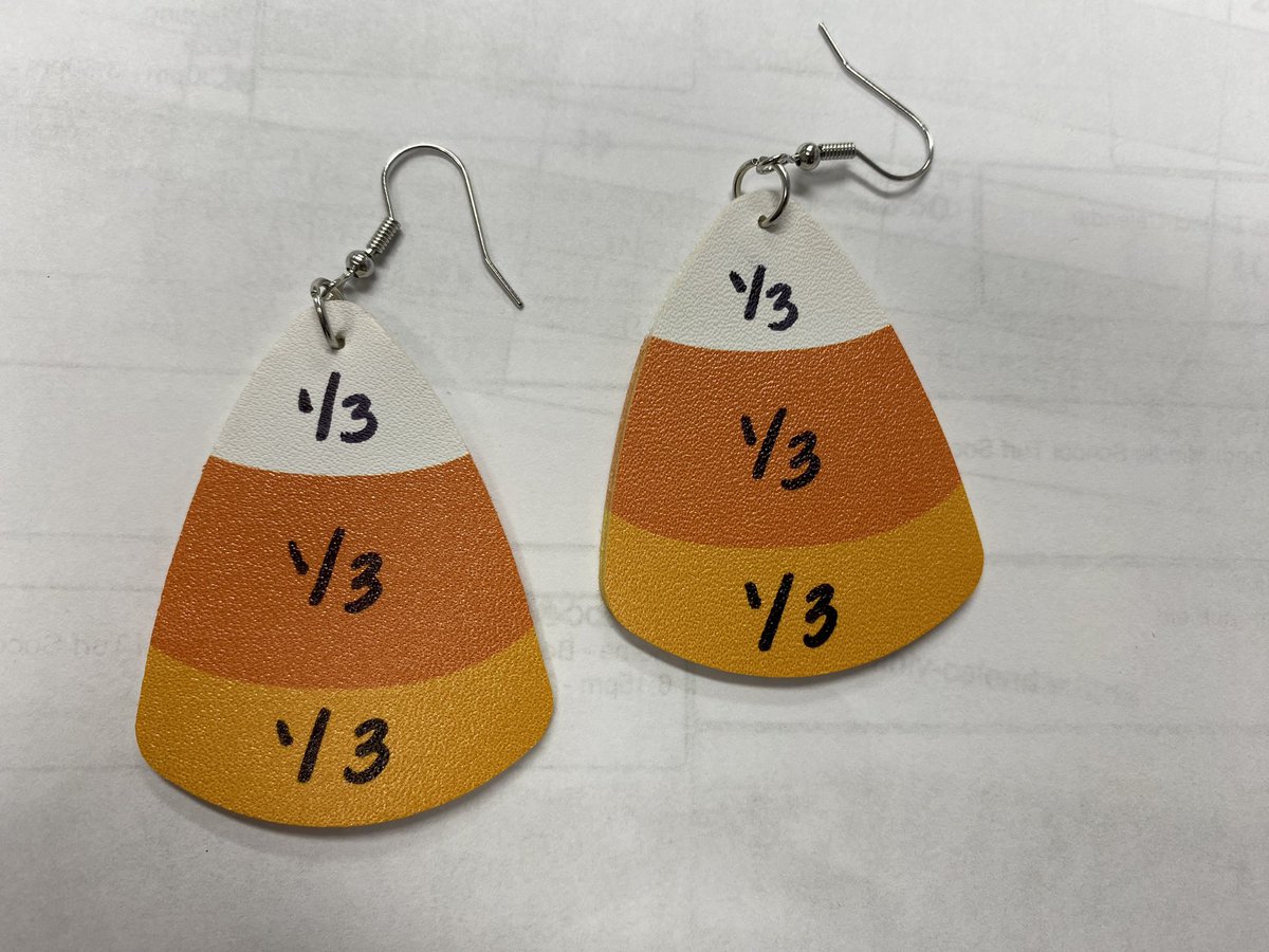 DanielleLegnard's tweet photo. You know you have the Math Curse when you take a sharpie marker and turn your candy corn earrings into fraction earrings!! #mathtastic #themathcurse @BethelCTSuper @brookskristen1 https://t.co/3GgaFBVjwm
