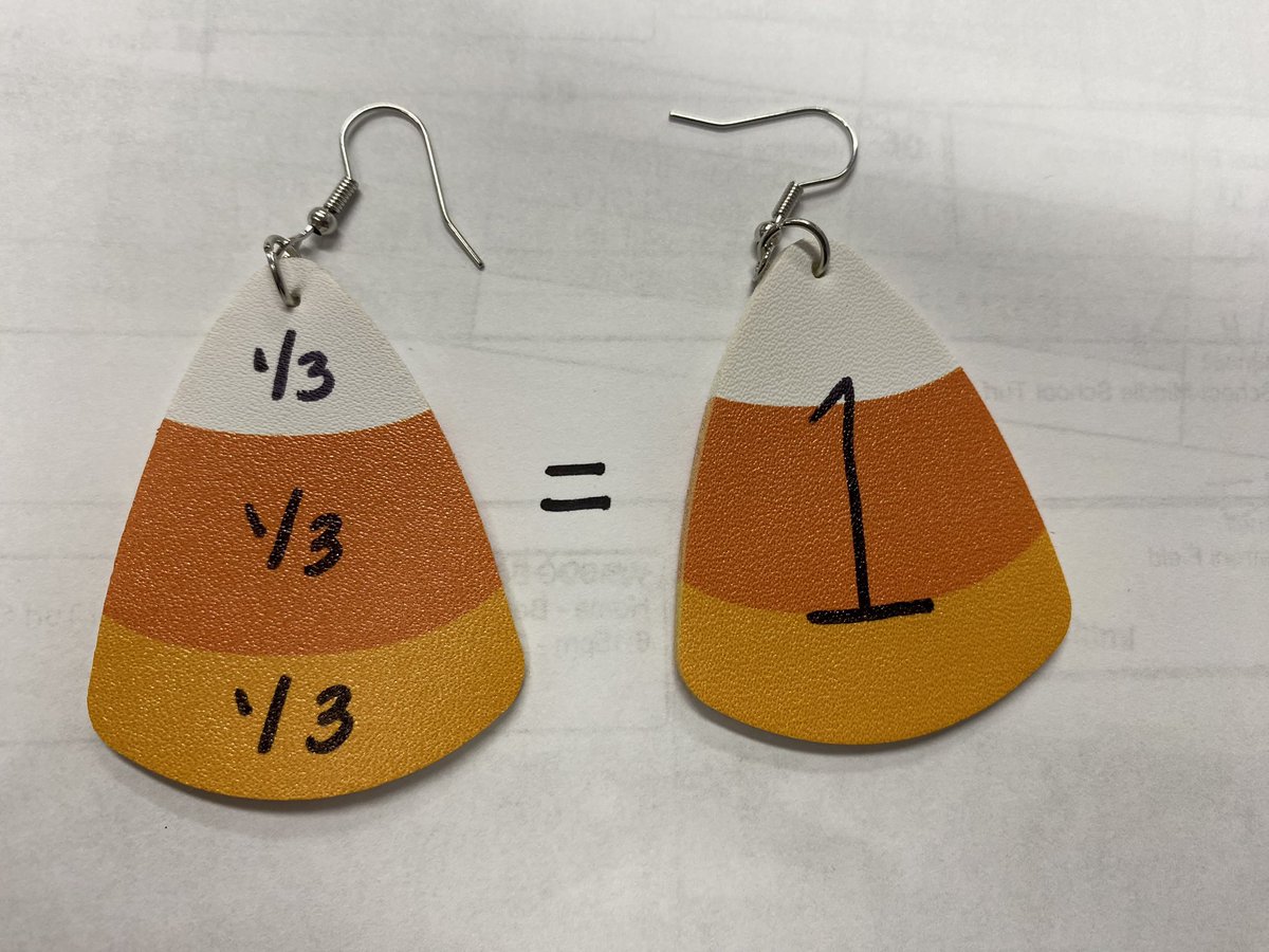 DanielleLegnard's tweet photo. You know you have the Math Curse when you take a sharpie marker and turn your candy corn earrings into fraction earrings!! #mathtastic #themathcurse @BethelCTSuper @brookskristen1 https://t.co/3GgaFBVjwm