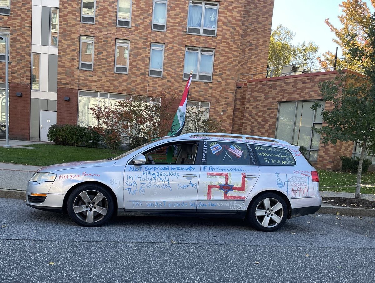 JewishWonk's tweet photo. Yesterday, a person was driving around White Plains, a New York suburb with a large Jewish community, with hate speech on their car and a Palestinian flag. Today they've been arrested for forging the license plate. 

Police found a gun in the car. https://t.co/2IrY6AGiv2