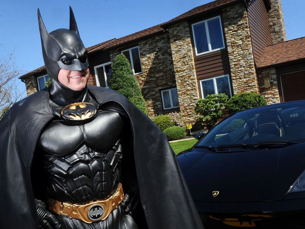In 2007, a 43-year-old man named Lenny Robinson from Maryland sold his cleaning business to pursue his dream of becoming Batman. 

He had bought a replica of the iconic suit earlier to impress his son, which he refined over time. Lenny also acquired his own Batmobile, a black