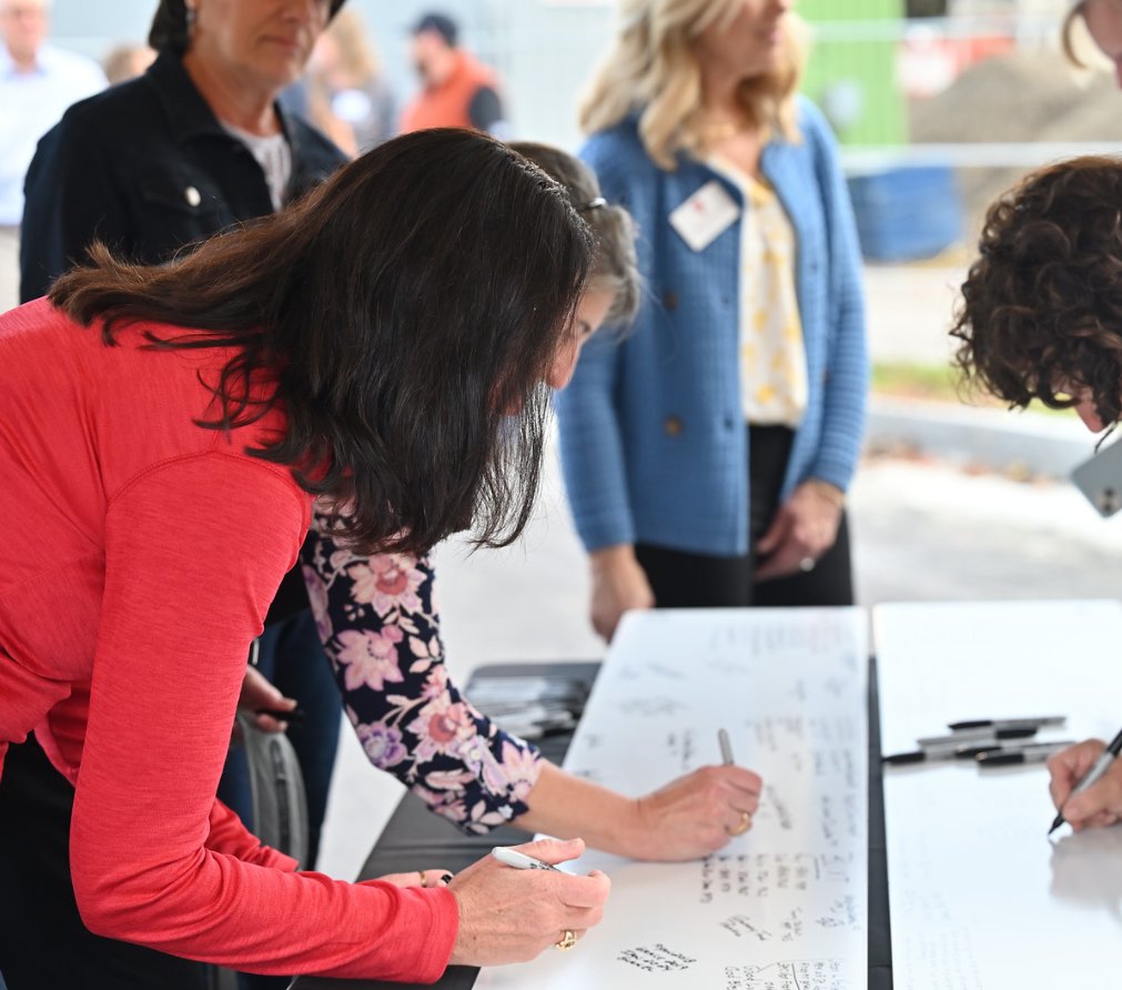 NHDeptEd's tweet photo. We are excited to see Trinity High School and St. Joseph Junior High School expand and flourish in the Manchester community, while also providing more options for Granite State families. #BeamSigning #SchoolConstruction @CathSchoolsNH https://t.co/evGq1Z3mpz