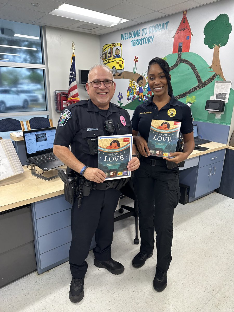 Mrs_Jimenez_BHE's tweet photo. Read for the Record! Thank you to the City  of Hollywood police officers and Univision for coming out to support BHE!  @BHEPrincipalFam @sylvieco19 @Univision https://t.co/lC6H7u3T7O