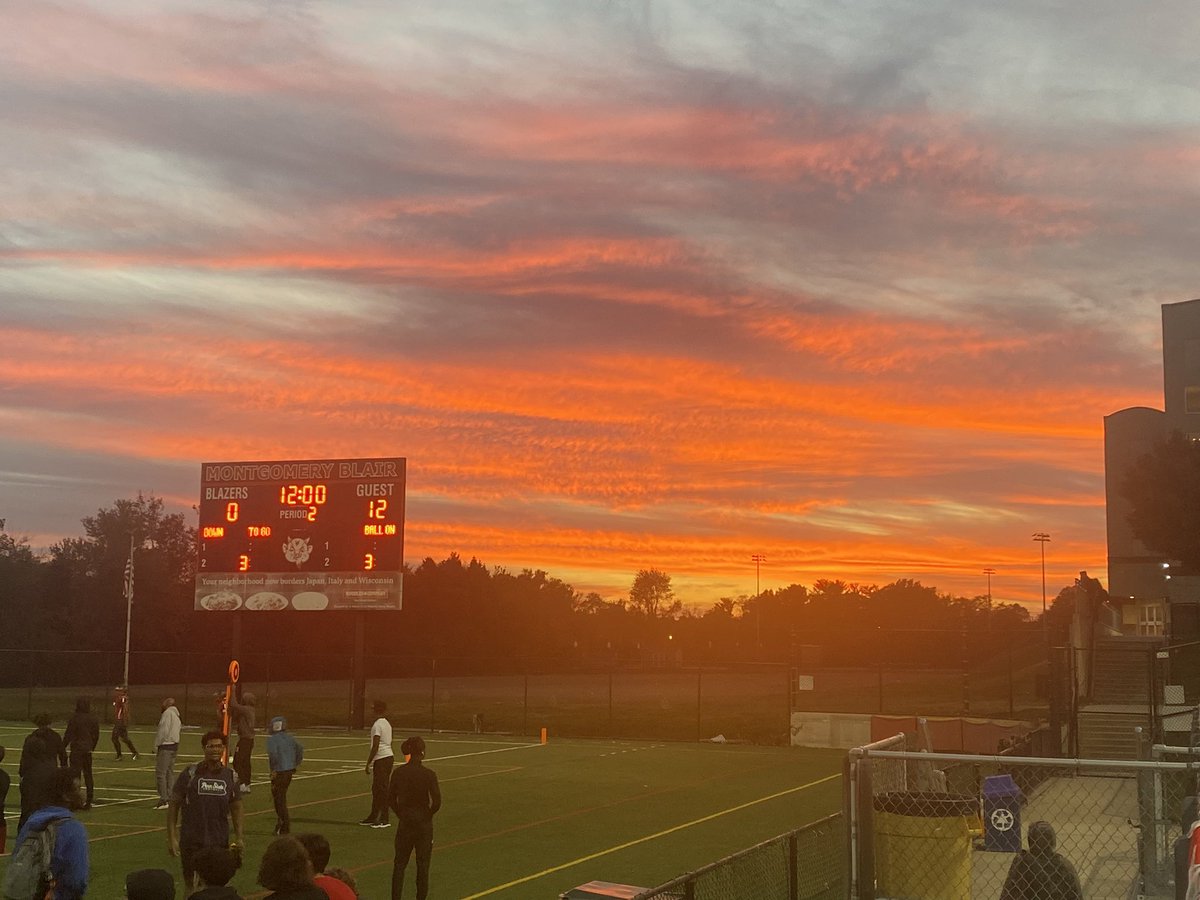 Blair_ELD's tweet photo. Busy night a Blair! Another fantastic #VocesUnidas put on by our World Languages Dept et al and a beautiful sunset over JV football’s last game! Wish the scoreboard looked as nice, but I got to see my son make moves! #BlazerMom https://t.co/BH8IdYMM17