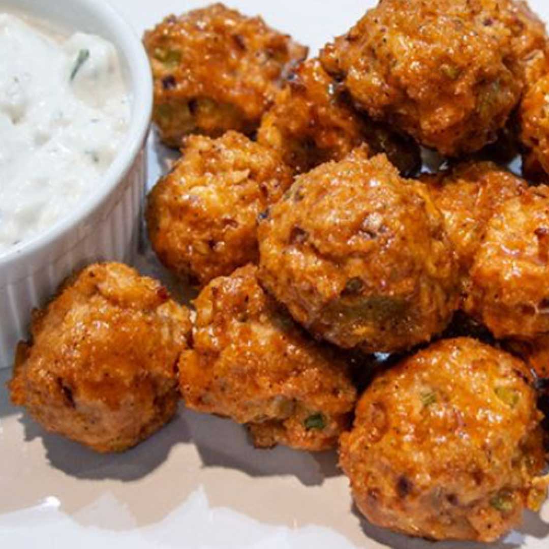 I made these again! We love them - Cynthia. This is just one of the comments left on this Buffalo Chicken Meatballs recipe page. A must try at your next gathering...or keep them all to yourself 😉 bit.ly/3Mmv7Ur #biggreenegg #recipe #buffalo #chicken #meatballs