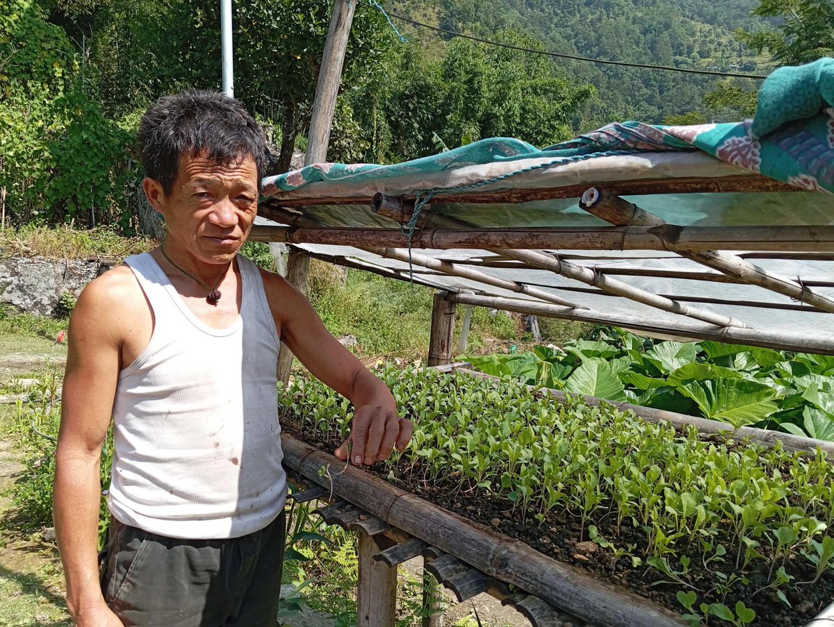 Luck Kumar Rai, a farmer from Khotang District, showcases his thriving sprouts.

dZi partners with mountain farmers to use organic agriculture to create thriving economies in Eastern Nepal.