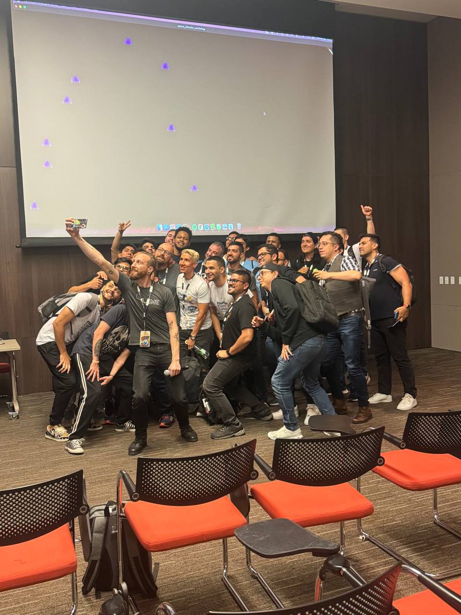 BlueFireOSS's tweet image. Happy participants of the Flame space shooter workshop at #FlutterConfLatam! 🥳
