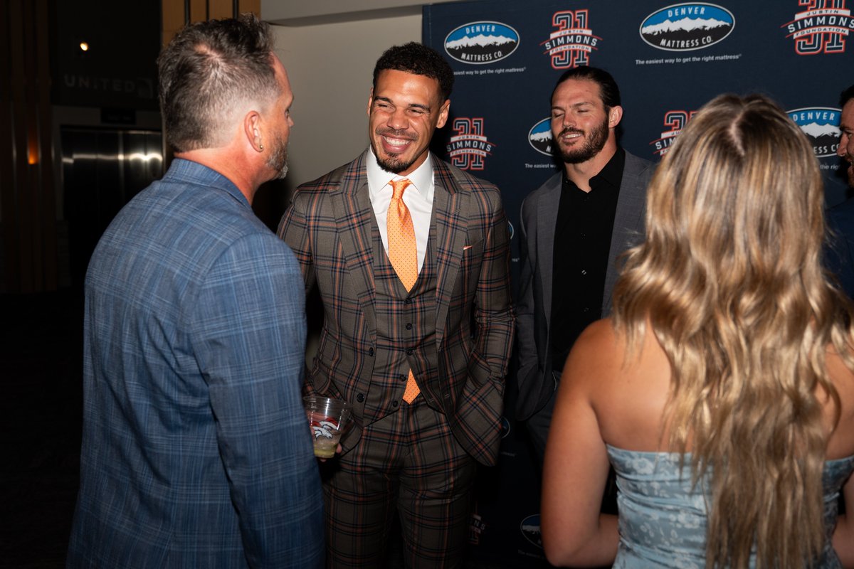 NFLPA's tweet photo. @Vikings @Cambeezy_ @UHC @VikingsPR @broncos safety Justin Simmons (@jsimms1119) and his wife Taryn hosted their 3rd annual "A Night With The Stars" Gala.
 
15 teammates and over 200 guests enjoyed a silent auction &amp; dinner to benefit multiple local Denver causes, totaling nearly $100,000 in awarded grants. ⭐️ https://t.co/pp05WSSpeO