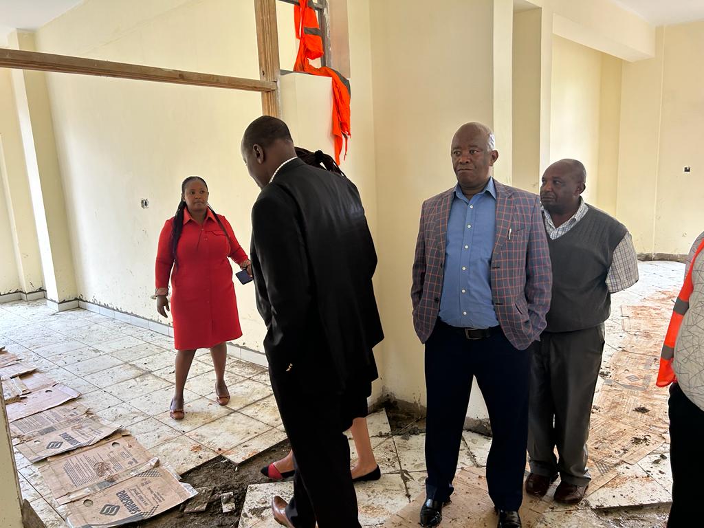 Finishing tiling for Kandara Hospital new wards .