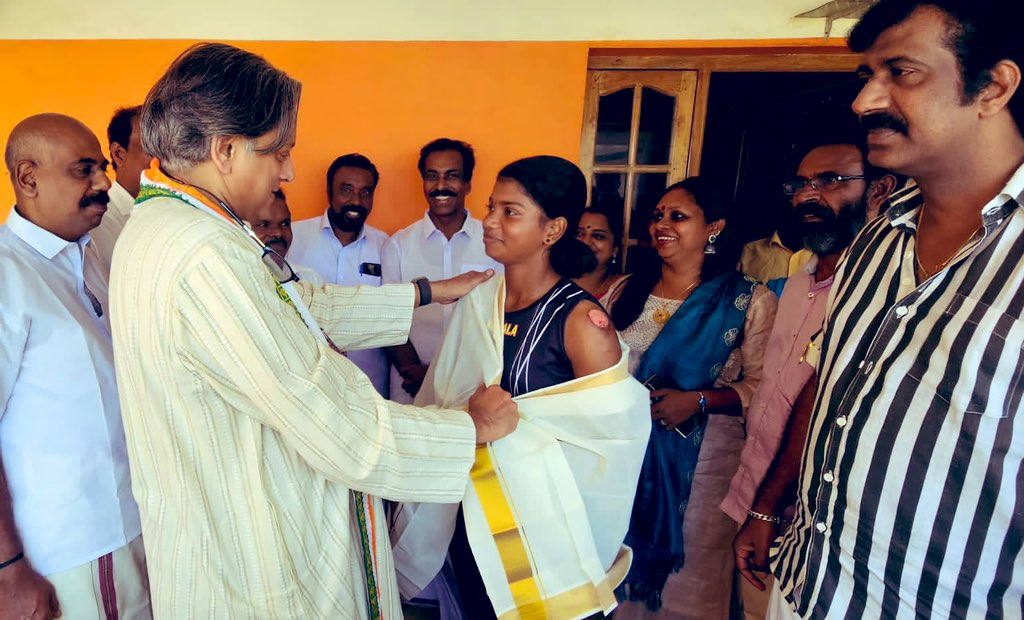 ShashiTharoor's tweet photo. Visited the home of athlete Sheeba Stephen, a humble fisherman’s daughter who excelled at the State Inter-School sports, emerging as a double Gold Medal winner in both the long jump and  high jump events. Proud to honour her for triumphing against all odds. https://t.co/jMl8yDLpoq