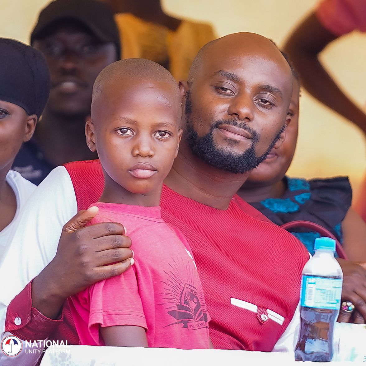DavidLRubongoya's tweet photo. Mpuuga Jeremiah is now 7 years old. He is a son to Olivia Lutaaya, our comrade who remains detained at Luzira Prison for over three years- simply because of her political views. Today Olivia Lutaaya should have been one of the parents attending her son's Parents' day event at his school. But she is in prison. So we joined Olivia's auntie and other parents to be with Jeremiah on this day when he moves from Top Class to Primary One. Even though it was a day of celebration between parents and their children, you could not miss the pain in Jeremiah's teary eyes. Her auntie, told us that in the morning as they prepared to come, he told her 'Kale singa maama abadewo!' 

#FreeAllPoliticalPrisonersUganda 
#BringBackOurPeople