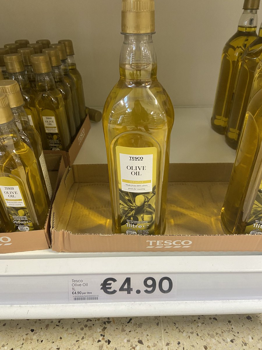 ianaldo21's tweet photo. The price of Olive Oil has risen astronomically in the the UK in the past 18 months. All the major shops have aligned on the pricing so I put it down to possibly being a global supply chain cost increase. No, I was in Ireland this week and… erm, riddle me this @Tesco? ¯\_(ツ)_/¯ https://t.co/hlCGWw7xSN