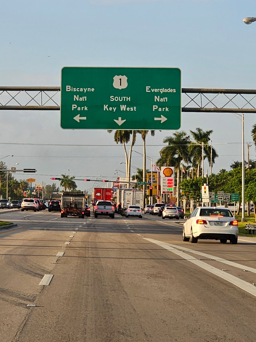 It's Friday, and the weekend is calling! Who's passing the road sign: 'South 1 to Key West'? The journey to the Keys begins, and the excitement is palpable.🚗🌴🏝️ #WeekendGetaway #KeyWestBound #IslandAdventures #IslandLife #KeyWest #RoadTrip #MiamiToKeyWest #FantasyFest2023